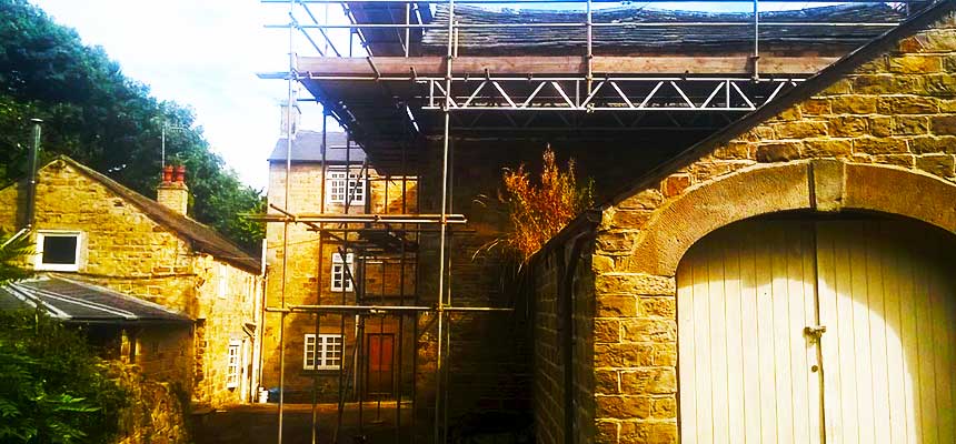 close up of intricate access scaffold installed around an awkward shaped house
